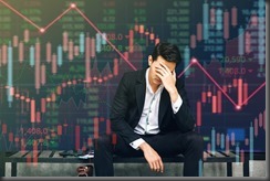 Business failure and unemployment problems from the economic crisis. Stressed businessman sits in panic digital stock market financial background. Stock market and global economic inflation recession.