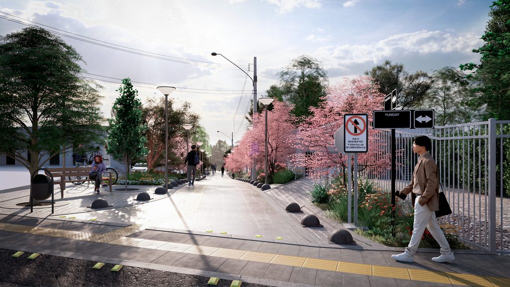Vecinos y autoridades municipales revisando los planos del diseño final para el proyecto Pasaje Orella en Valdivia