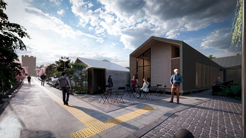 Vecinos y autoridades municipales revisando los planos del diseño final para el proyecto Pasaje Orella en Valdivia