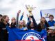 Deportistas compitiendo en remo en la Regata Eberhard Kossmann en Valdivia