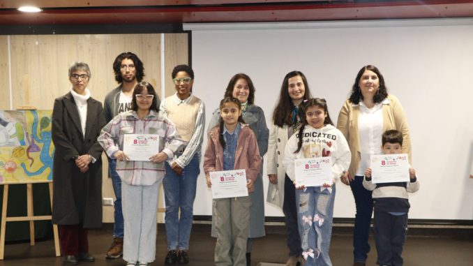 Niños premiados en el concurso de dibujos de microorganismos de la Universidad Santo Tomás
